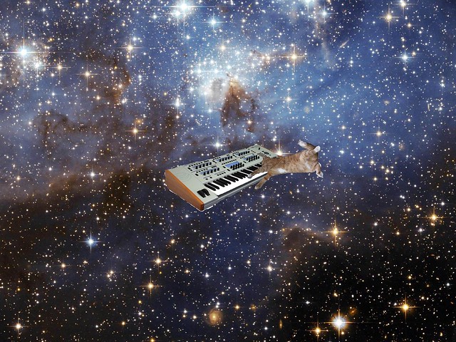 Cat Playing Synth in Space