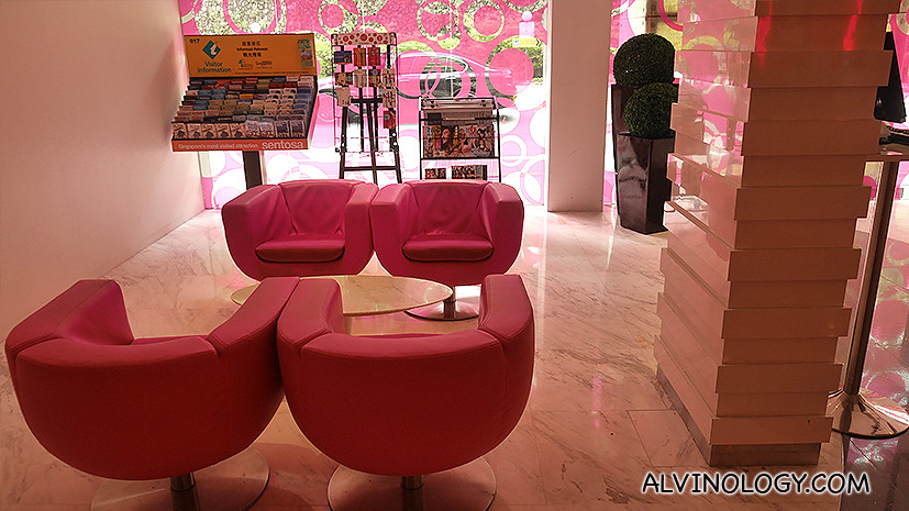 Pink capsule armchairs at hotel lobby