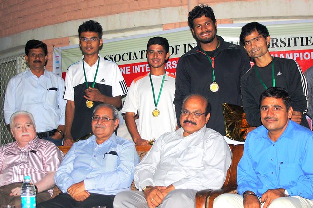 AMU North zone winner Lawn Tennis team members with the guest.