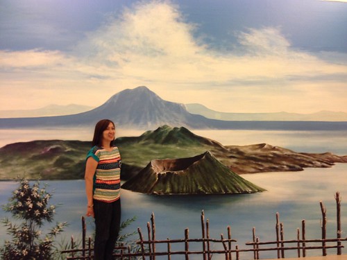 Divine, with taal lake mural