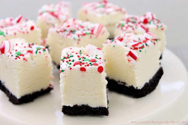 White Chocolate Peppermint Fudge on a white plate.