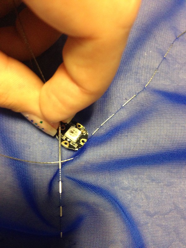 Stitching with conductive thread