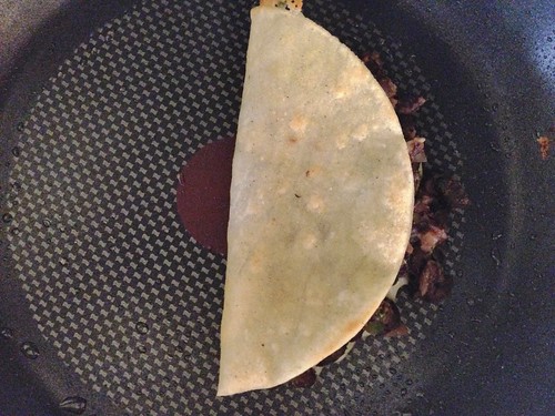 crunchy black bean taco in the pan