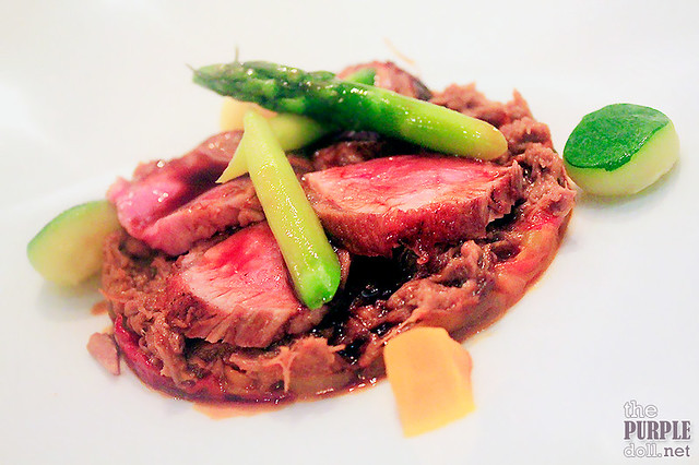 Slow-cooked lamb rack, rosemary aroma, piperade and argan oil