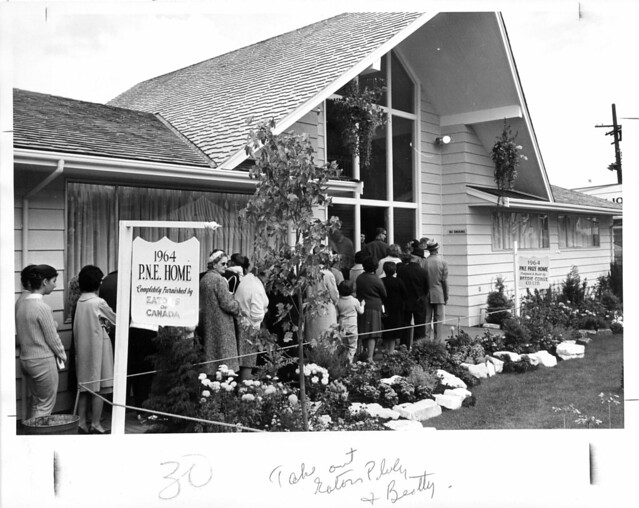 Crowd outside of 1964 P.N.E. program grand prize house