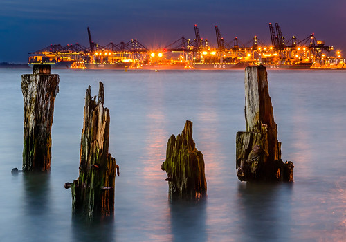 wood blue sea reflection water night port gold lights star long exposure ship timber cranes container pile hour burst piling groyne felixstowe piles containers groynes