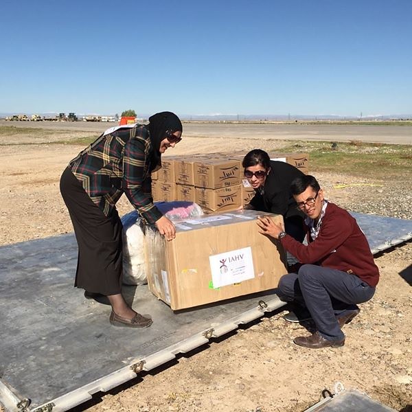 Volunteers of the International Association of Huiman Values (IAHV) the sister concern of the Art of Living loading relief materials for the Yazidis refugees in the Sinjar Mountains.