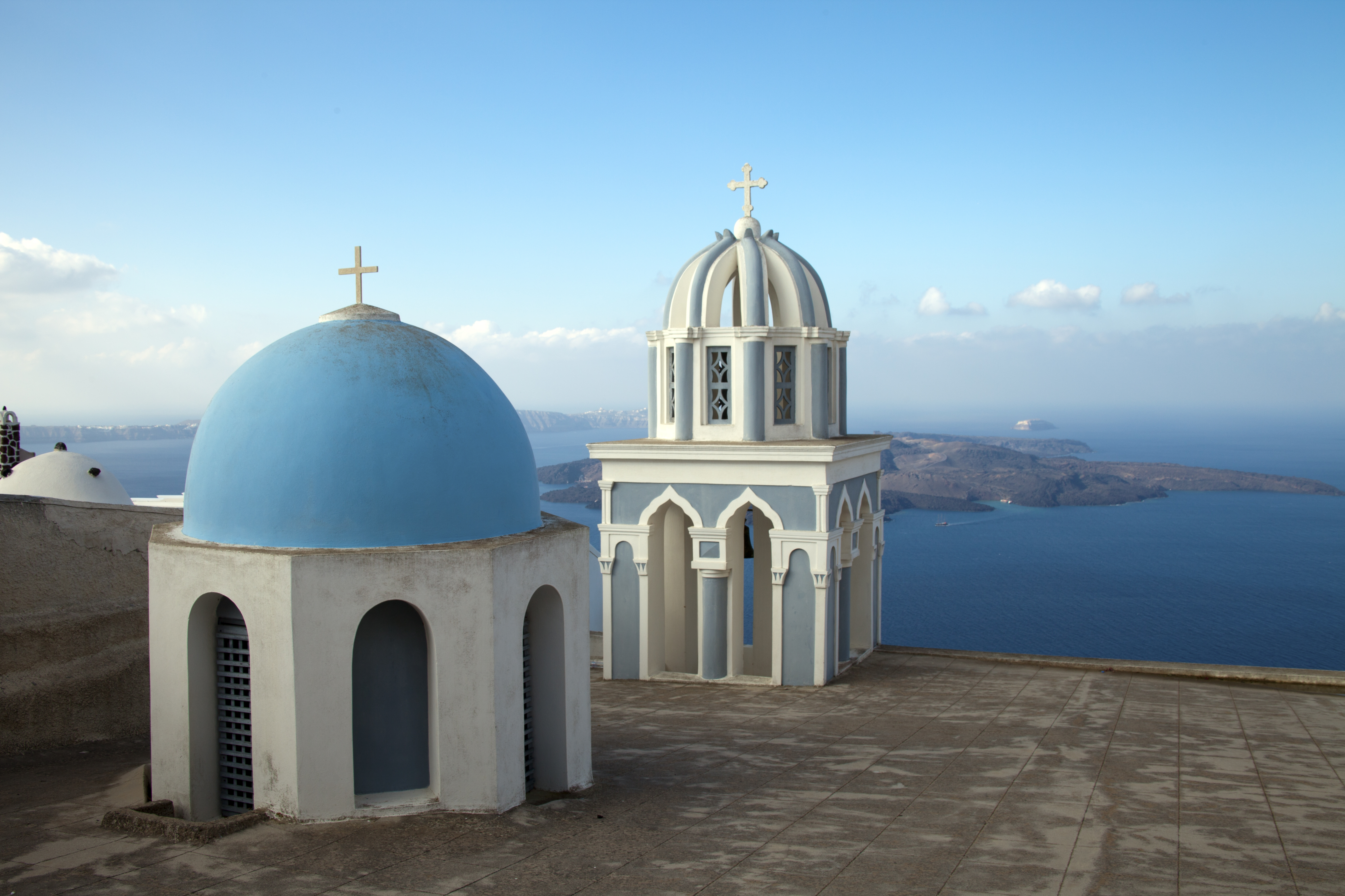 Blue domed churches in Santorini Greece near the town of Fira - architecture