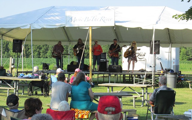 Guests enjoy warm summer breezes as they enjoy live Music by the River at Belle Isle State Park, Virginia