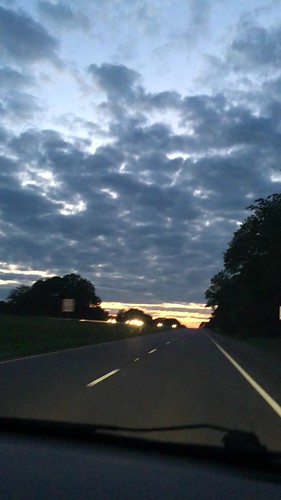 sunset clouds dark highway riding traveling