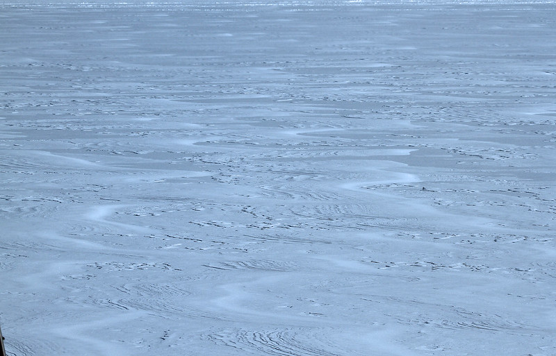wind pattern on ice with blue filter