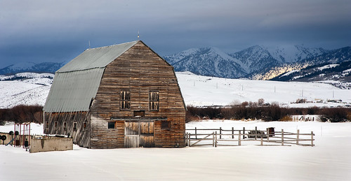 ranch winter usa snow storm mountains clouds barn rural farm rustic grover wyoming afton