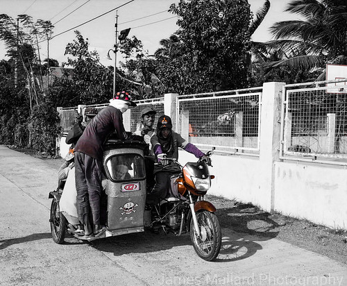 men blackwhite tricycle philippines motorbike riding sidecar overcrowding nuevaecija fujix100