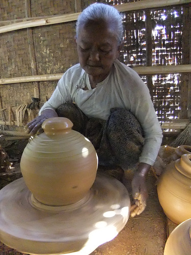Potter working in the pottery village on Inle Lake, Myanmar