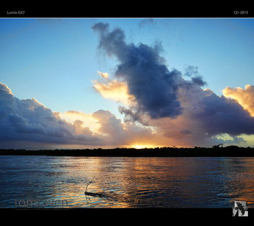 sunset sky sun water clouds reflections river flow lumix driftwood stick gx7 tomraven aravenimage q12015
