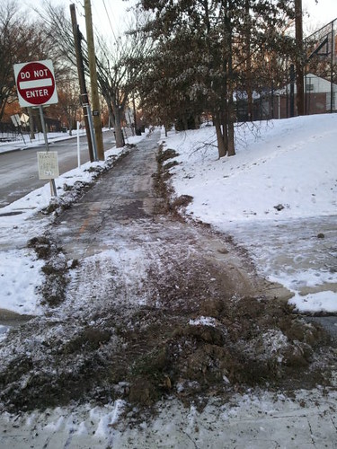 Dirt and grass upended in snow removal