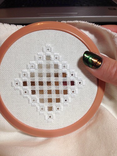 Hardanger ornament in progress- Threads cut and removed.