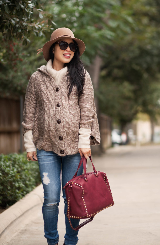 cute & little blog | petite fashion | maternity baby bump pregnant | knit cape poncho wool sweater, cowl sweater, distressed jeans, burgundy ankle boots, taupe wool felt floppy hat, burgundy studded satchel | winter layering outfit | third trimester