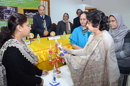 Mrs Sabiha Seemi Shah lighting the lamp at the Oath taking ceremony of School of Nursing