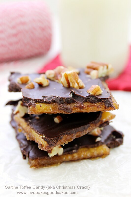 Saltine Toffee Candy stacked on a table cloth.