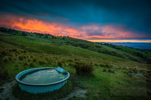 sunset newzealand christchurch sky water beautiful grass clouds landscape multicoloured canterbury hills nz southisland magical sumner canoneos5dmarkiii fabphotography fernandezbarrett
