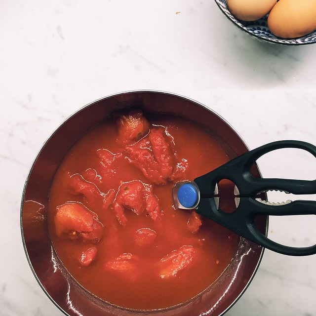 another great use for your kitchen shears - use to cut canned tomatoes for less mess