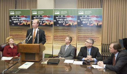 General Motors Global Public Policy Executive Director Greg Martin speaks at a press conference announcing the completion of the first-of-its kind purchase of verified carbon credits generated on working ranch lands by Chevrolet, at the U.S. Department of Agriculture (USDA), in Washington, D.C. on Monday, Nov. 17, 2014. (L to R Senator Debbie Stabenow (MI), General Motors Global Public Policy Executive Director Greg Martin, Ducks Unlimited Paul Schmidt, The Climate Trust Executive Director Sean Penrith, and USDA Natural Resources and Environment (NRE) Under Secretary Robert Bonnie). USDA photo by Tom Witham.