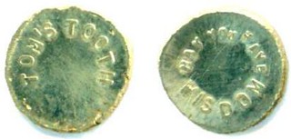 Tom's Tooth token in gold
