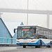 A YOUNGMAN NEOPLAN Articulated Bus in Heavy Snow