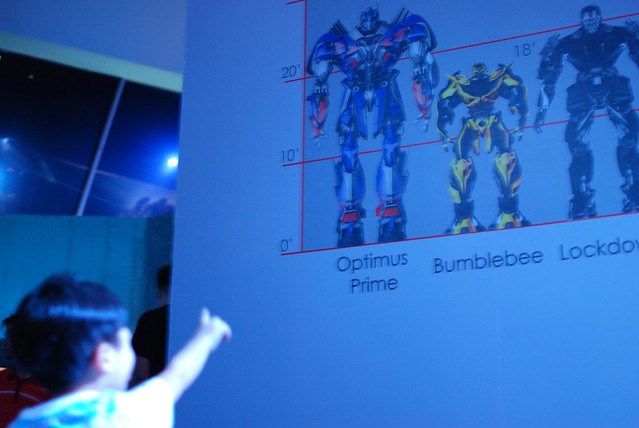 Learn all about Transformers' history and evolution in the Time Warp Zone (Zone 1). 