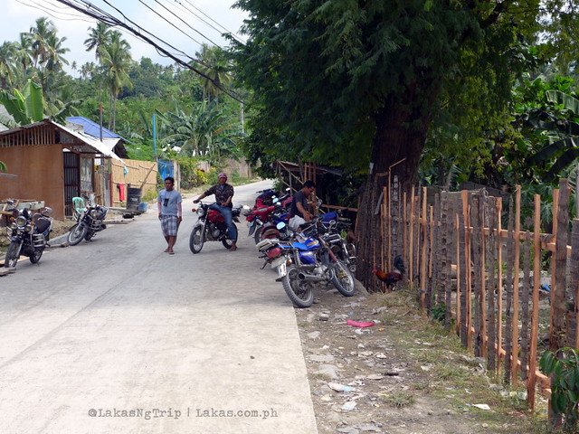 Habal-habals (public transportation motorcycles) waiting in the Kalubihon Falls intersection. Pampam Falls and Kalubihon Falls in Iligan City, Philippines