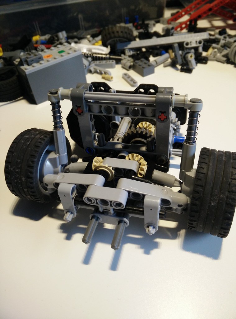 Small independent suspension with drive, caster angle and differential