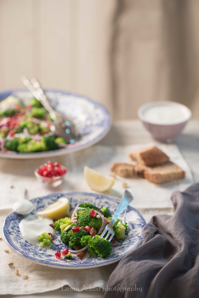 Broccoli salad with raisin, pomegranate and sunflowers seeds