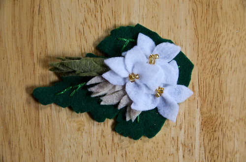 Place a few more flower buds with hot glue