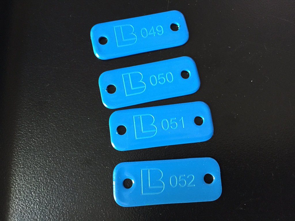 Laser etched powder coated metal tags