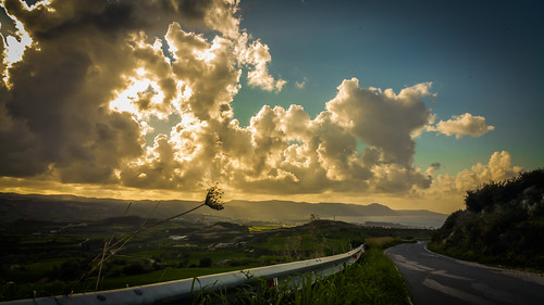 road sunset sky green clouds fields