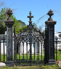 Ornate iron gates at a cemetery plot