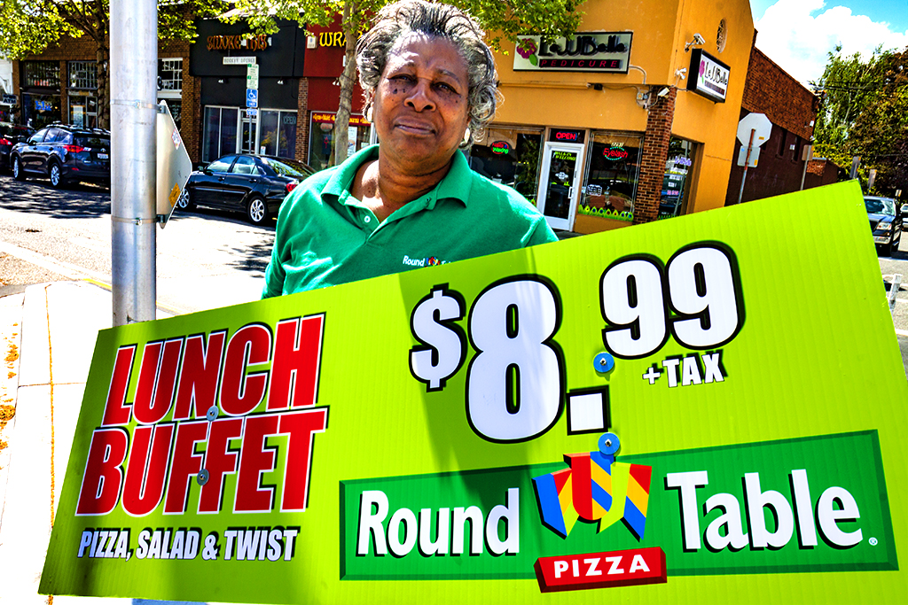 Woman-advertising-Round-Table-Pizza--Santa-Clara