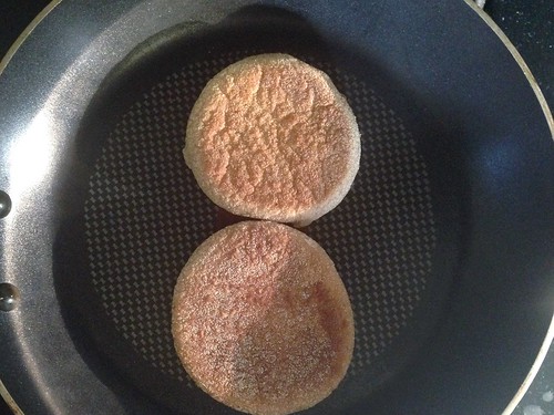 English muffin getting toasted in the pan