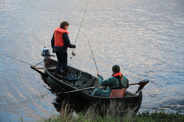 Two fishermen after samons
