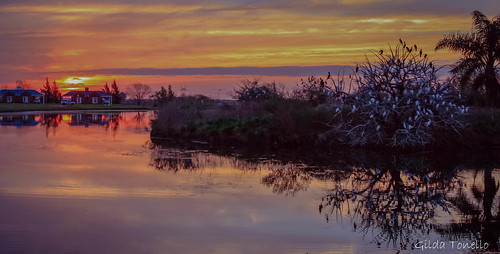 sunset pordosol argentina lago reflexos entrerios villaelilsa