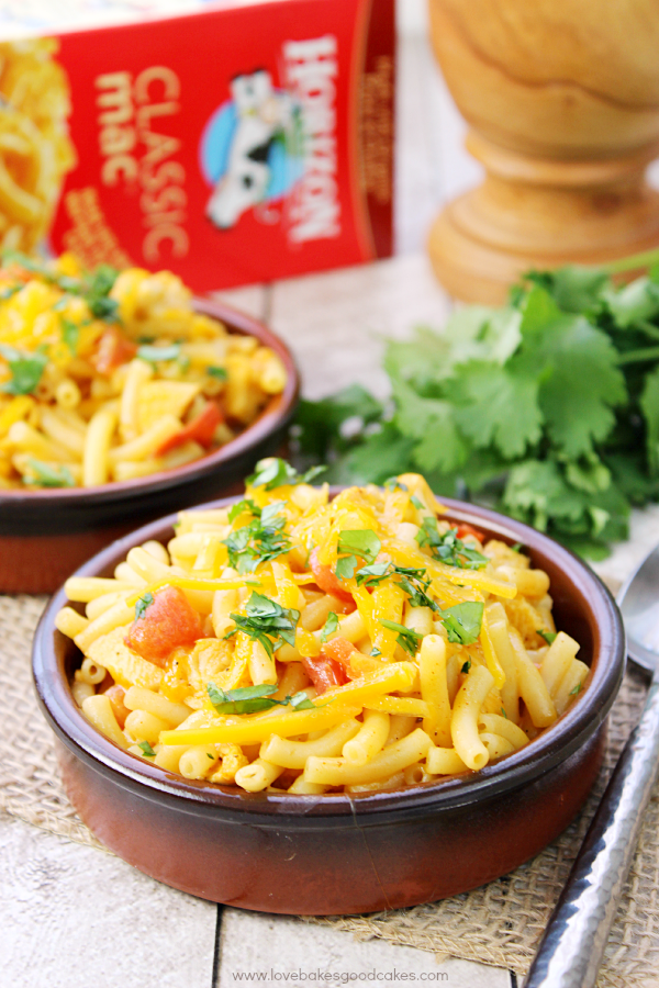 Quick and Easy King Ranch Mac & Cheese in two bowls with a spoon.