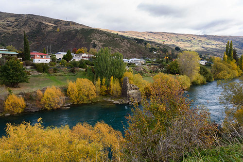 autumn trees houses newzealand sky water clouds buildings river landscape hills southisland centralotago rune roxburgh cluthariver tripdownsouth teviotvalley