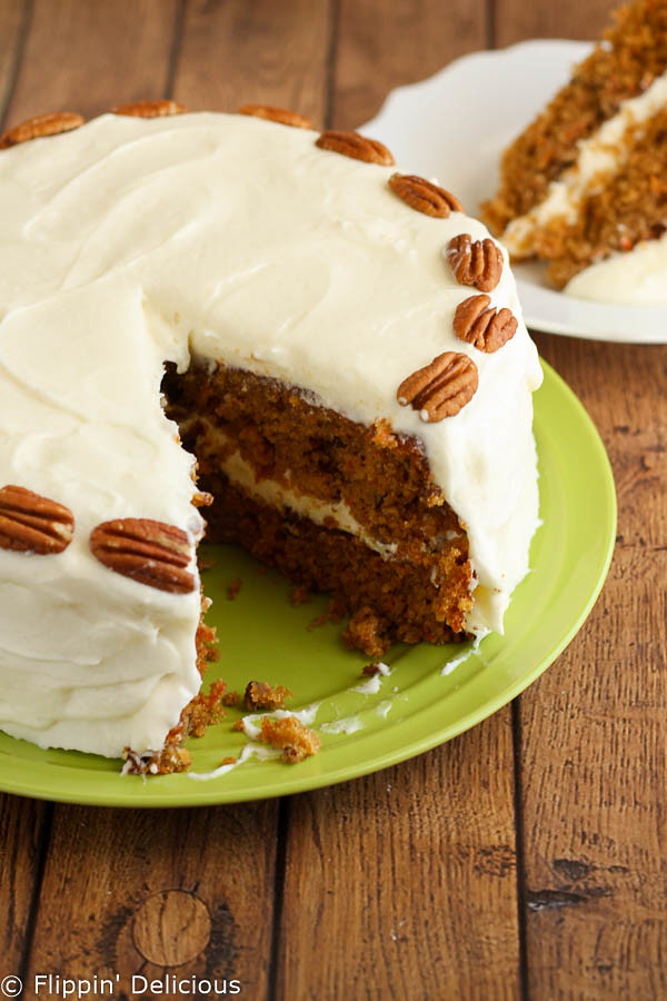 Traditional gluten-free carrot cake frosted with a whipped cream cheese buttercream. Moist and delicious!