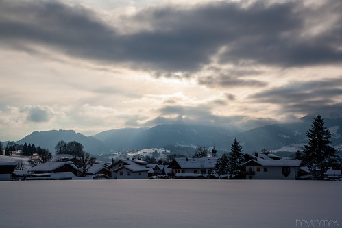 winter sky sun snow mountains clouds germany bayern deutschland village view peaceful allgau békés hinang
