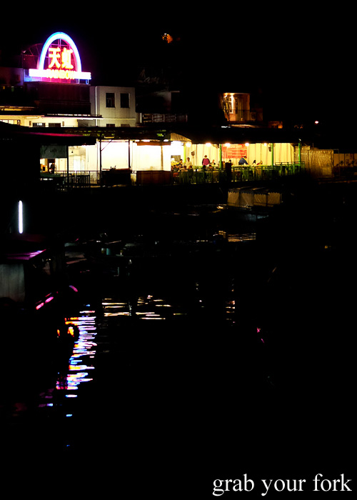 Rainbow Seafood Restaurant by night on Lamma Island, Hong Kong