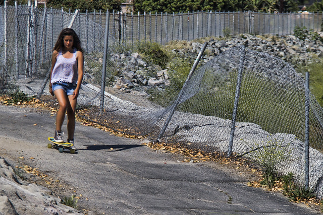 Skateboarder at the riverbed
