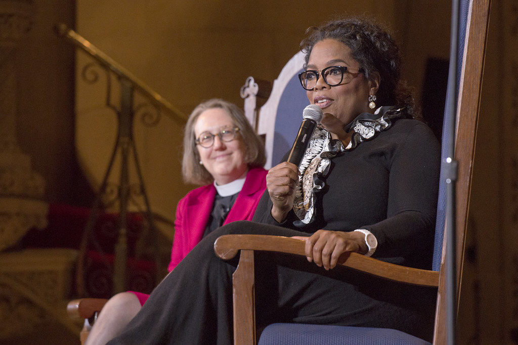 Rev. Jane Shaw looks on as Oprah Winfrey answers questions from students. (Photo: L.A. Cicero) 