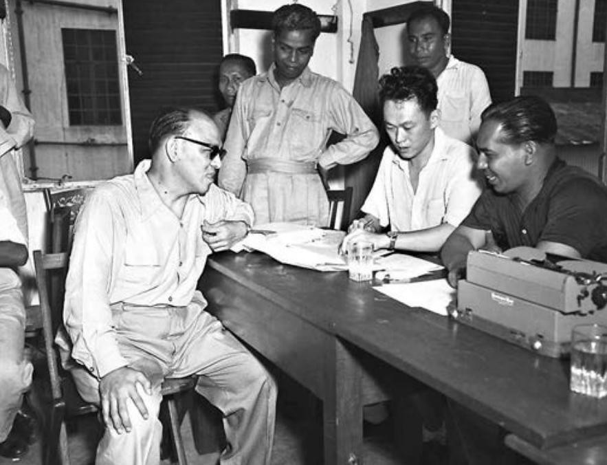 1952 POSTAL STRIKE: Mr Lee meeting postal workers at their quarters in Maxwell Road. He secured for them salary increases from the colonial government through a combination of strikes, negotiations and favourable press coverage. - picture via ST files