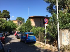 every day and night this street is blocked by parking cars (for big vehicles like fire fighters) and nobody cares or acts. #italianparking